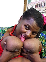 Fat ebony woman  with huge tits