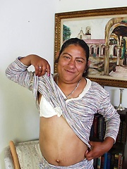 Amateur latina granny Olivia pust huge dildo into own vagina