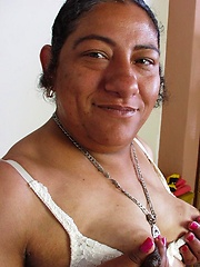 Amateur latina granny Olivia pust huge dildo into own vagina