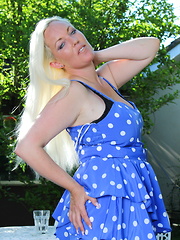 Naughty British housewife playing in the garden