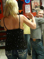 Hot blonde with huge tits gets covered in cum while in the theater