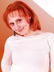 Horny red housewife playing with herself